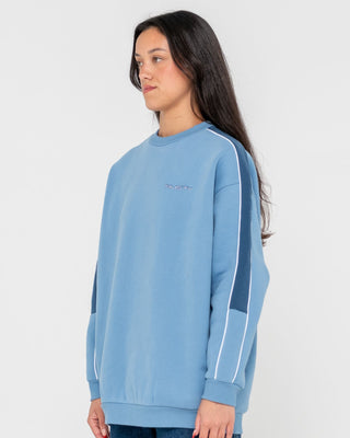 Woman wearing Two Timer Panelled Crew Fleece in Glacier Lake