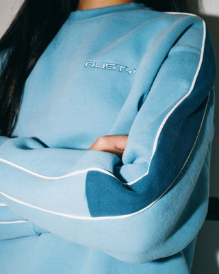 Woman wearing Two Timer Panelled Crew Fleece in Glacier Lake