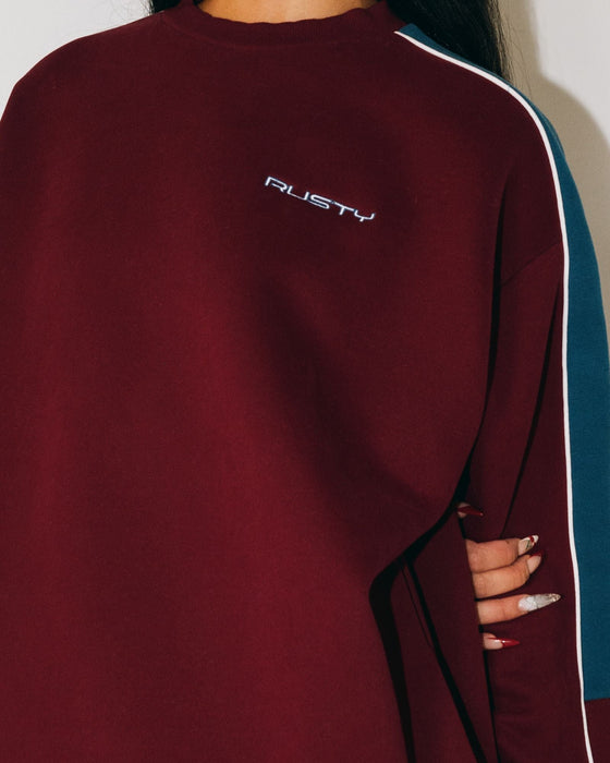 woman-wearing-two-timer-panelled-crew-fleece-in-rhubarb