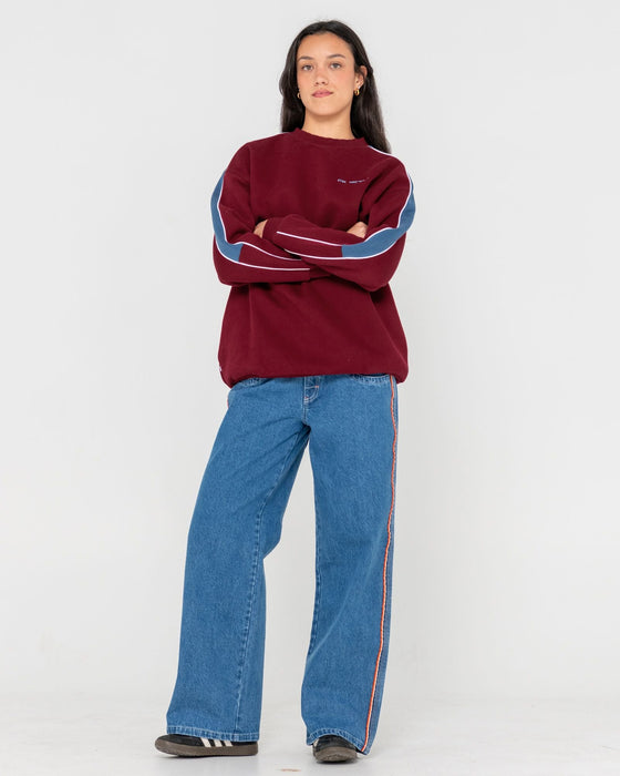 woman-wearing-two-timer-panelled-crew-fleece-in-rhubarb