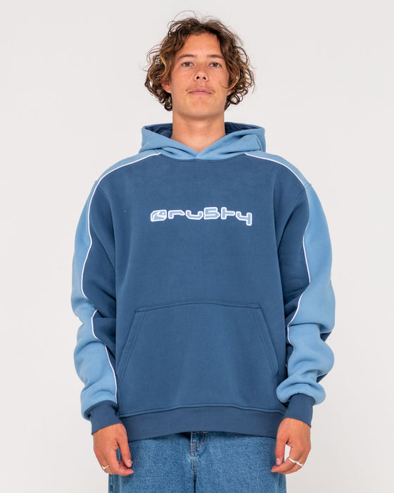 man-wearing-panela-anderson-hooded-fleece-in-atlantic-blue
