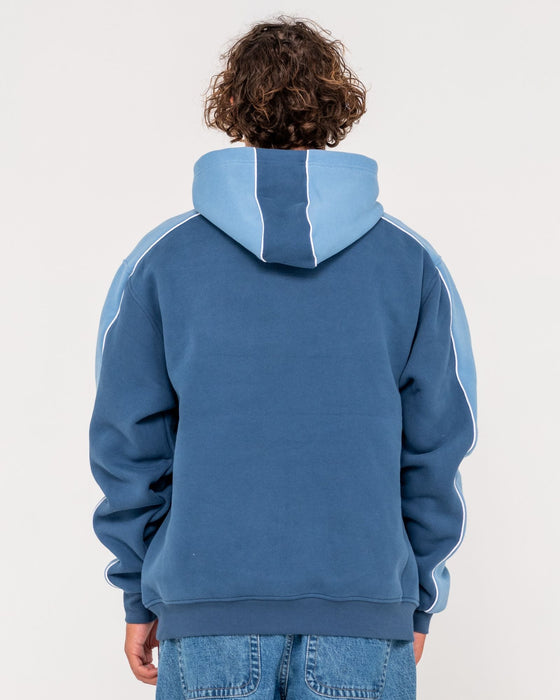 man-wearing-panela-anderson-hooded-fleece-in-atlantic-blue