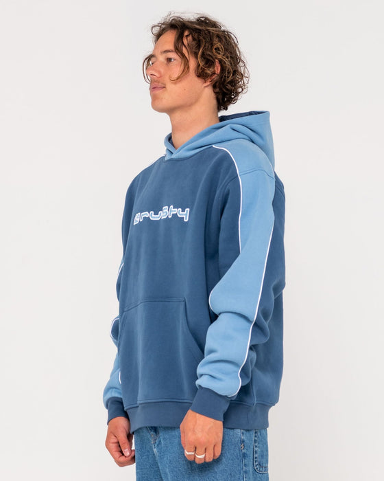 man-wearing-panela-anderson-hooded-fleece-in-atlantic-blue
