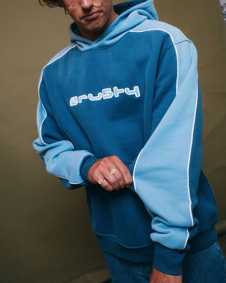Man wearing Panela Anderson Hooded Fleece in Atlantic Blue