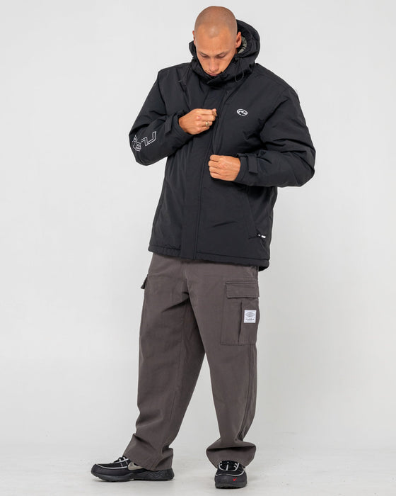 man-wearing-the-experience-waterproof-jacket-in-black