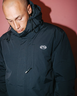 Man wearing The Experience Waterproof Jacket in Black