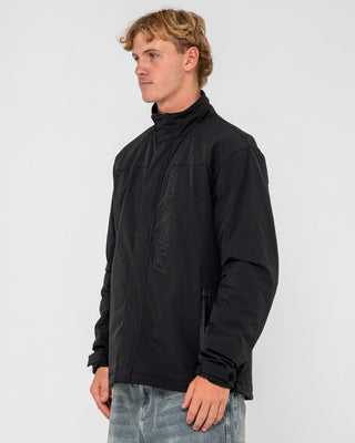 Man wearing Technic 4 Way Stretch Jacket in Black