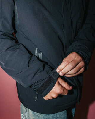 Man wearing Technic 4 Way Stretch Jacket in Black