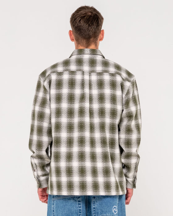 man-wearing-zeal-zip-thru-over-shirt-in-army-green