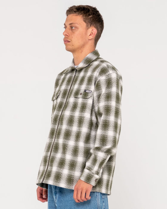 man-wearing-zeal-zip-thru-over-shirt-in-army-green