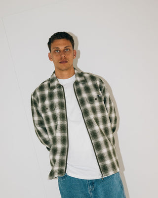 Man wearing Zeal Zip Thru Over Shirt in Army Green