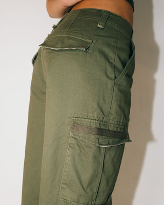 Woman wearing Tank Girl Low Rise Wide Fit Cargo Pant in Shadow Army 2