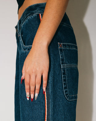 Woman wearing Flip Mommy Low Rise Wide Leg Denim Jean in Deep Sea Blue