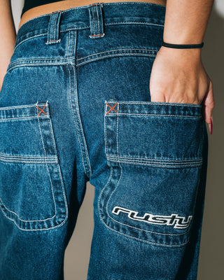 Woman wearing Flip Mommy Low Rise Wide Leg Denim Jean in Deep Sea Blue