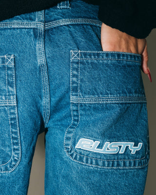 Woman wearing Flip Mommy Low Rise Tapeless Denim Jean in Authentic Blue