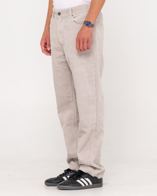 Man wearing Rifts Straight Leg Cord Pant in Oyster Grey