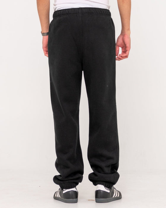 man-wearing-core-division-trackpant-in-black