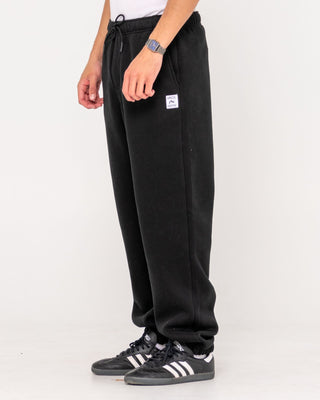 Man wearing Core Division Trackpant in Black