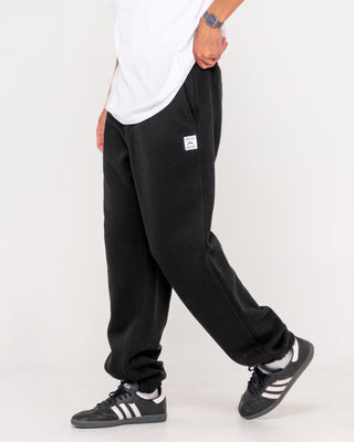 Man wearing Core Division Trackpant in Black