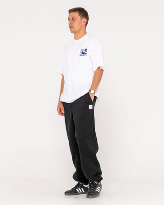 Man wearing Core Division Trackpant in Black