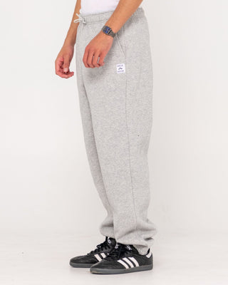 Man wearing Core Division Trackpant in Grey Marle