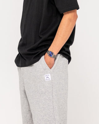 Man wearing Core Division Trackpant in Grey Marle