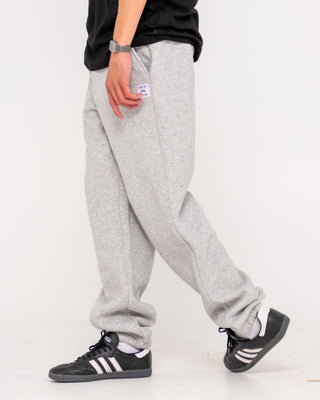Man wearing Core Division Trackpant in Grey Marle