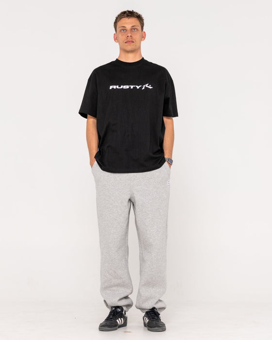man-wearing-core-division-trackpant-in-grey-marle