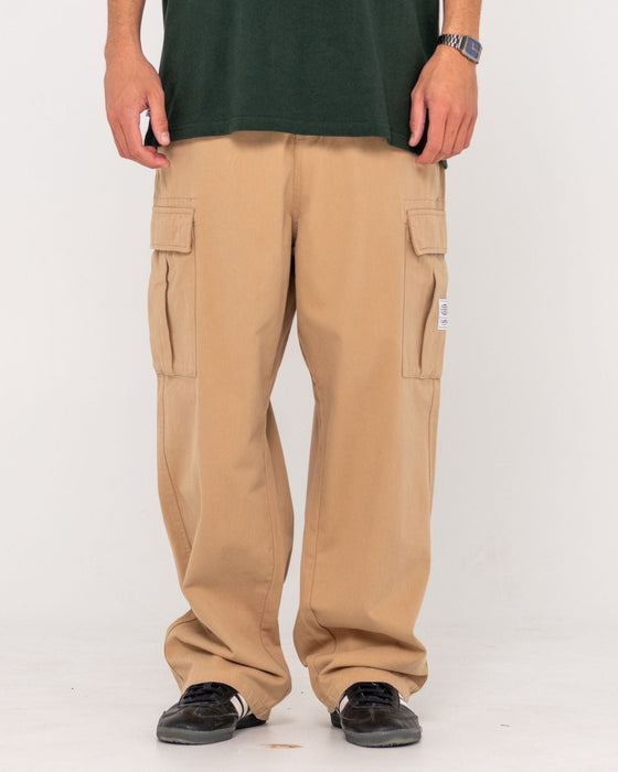 man-wearing-commando-cargo-pant-in-light-khaki