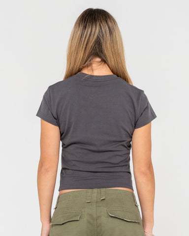 Woman wearing Rusty Essentials Skimmer Baby Tee in Grey