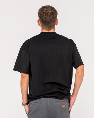 Man wearing Vital Rusty Short Sleeve Tee in Black