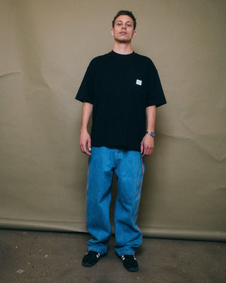 Man wearing Steezey Short Sleeve Heavy Tee in Black