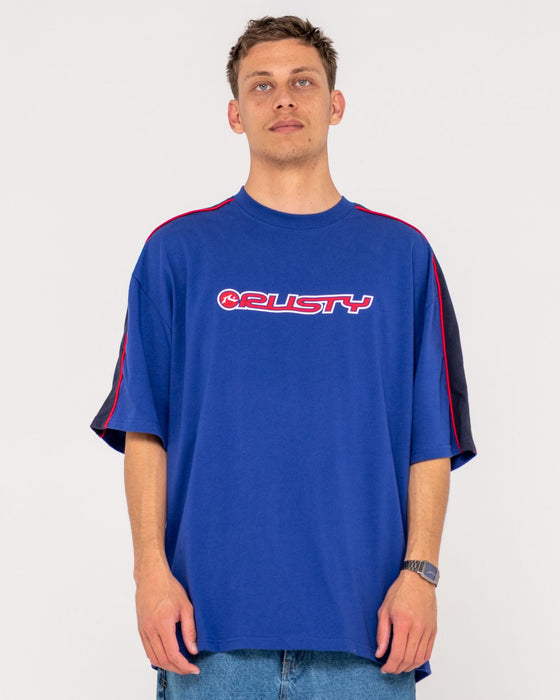 man-wearing-alonso-short-sleeve-tee-in-marazine-blue