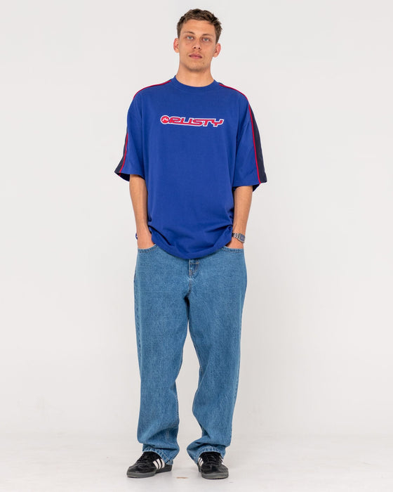 man-wearing-alonso-short-sleeve-tee-in-marazine-blue