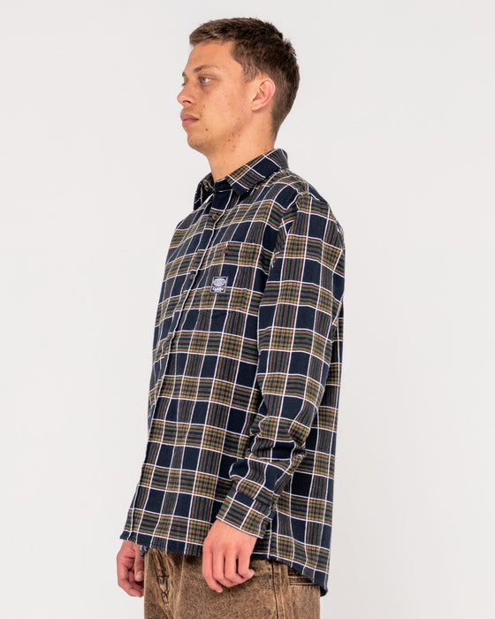 man-wearing-brooks-long-sleeve-shirt-in-navy-cream