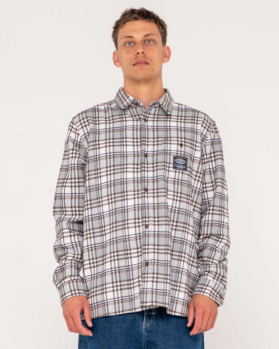 man-wearing-brooks-long-sleeve-shirt-in-pinecone
