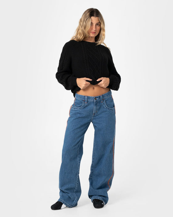 woman-wearing-two-tales-knitted-crew-in-black