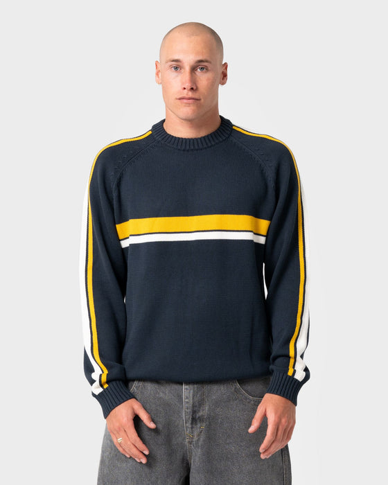 man-wearing-white-lines-2-0-knitted-crew-in-steel-blue