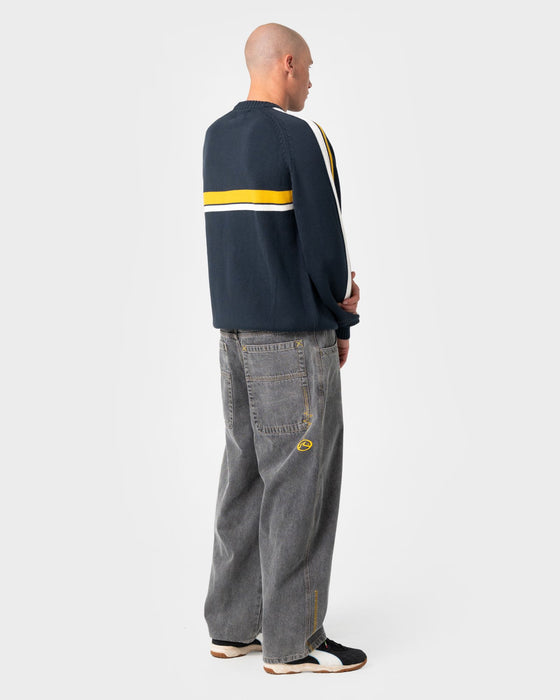 man-wearing-white-lines-2-0-knitted-crew-in-steel-blue
