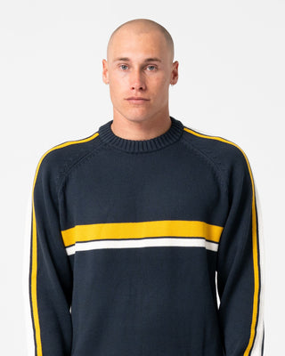 Man wearing White Lines 2.0 Knitted Crew in Steel Blue