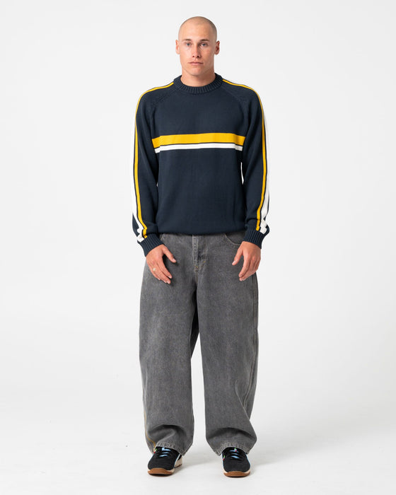 man-wearing-white-lines-2-0-knitted-crew-in-steel-blue