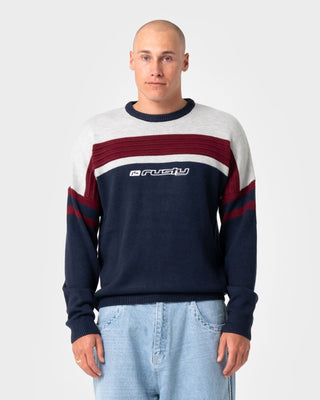 Man wearing Snow Trip Archive Sweater in Navy Blue