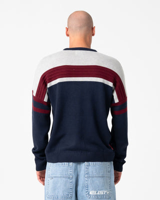 Man wearing Snow Trip Archive Sweater in Navy Blue