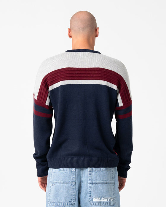 man-wearing-snow-trip-archive-sweater-in-navy-blue