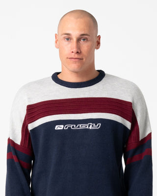 Man wearing Snow Trip Archive Sweater in Navy Blue