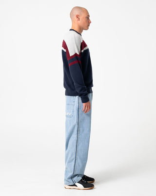 Man wearing Snow Trip Archive Sweater in Navy Blue