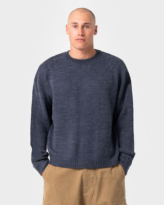 Man wearing Sea Captain Boxy Knitted Crew in Navy Blue