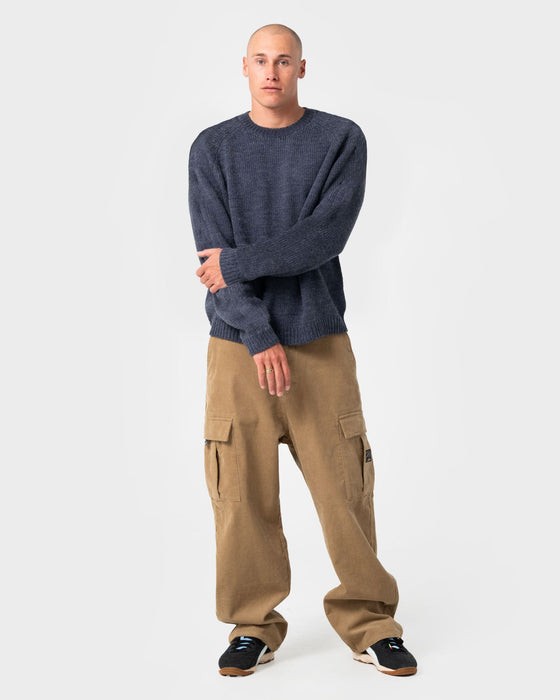 man-wearing-sea-captain-boxy-knitted-crew-in-navy-blue