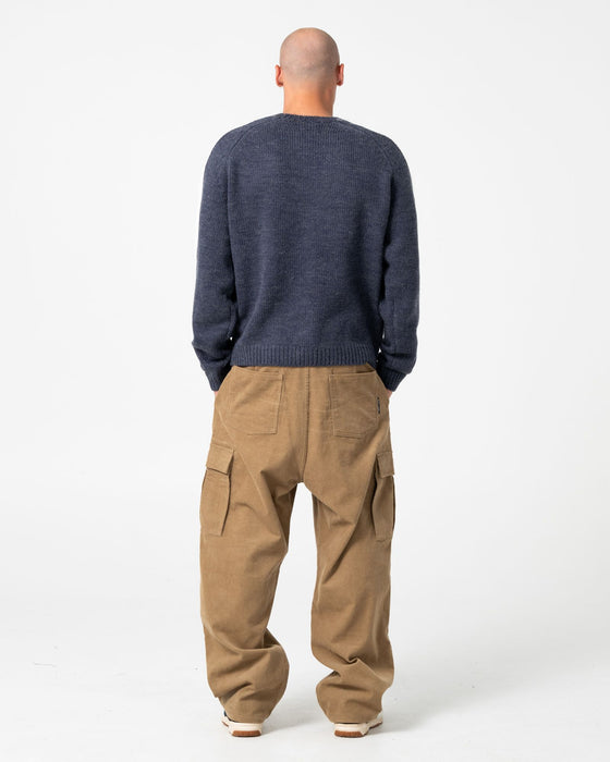man-wearing-sea-captain-boxy-knitted-crew-in-navy-blue