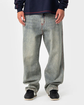 Man wearing Redemption Baggy Jean in Dirty Dawg